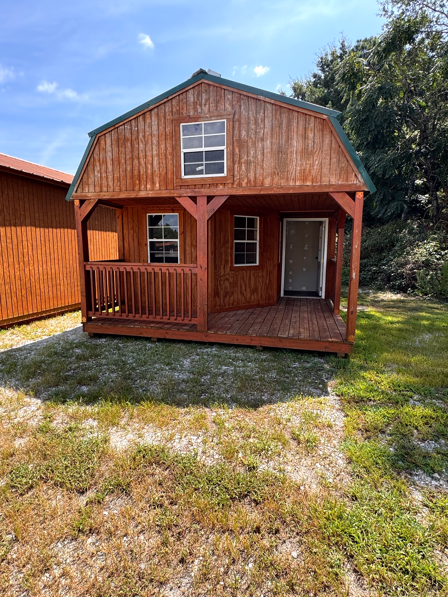 14x32 Wrap Around Porch Lofted Barn Cabin at Graceland of Cumming