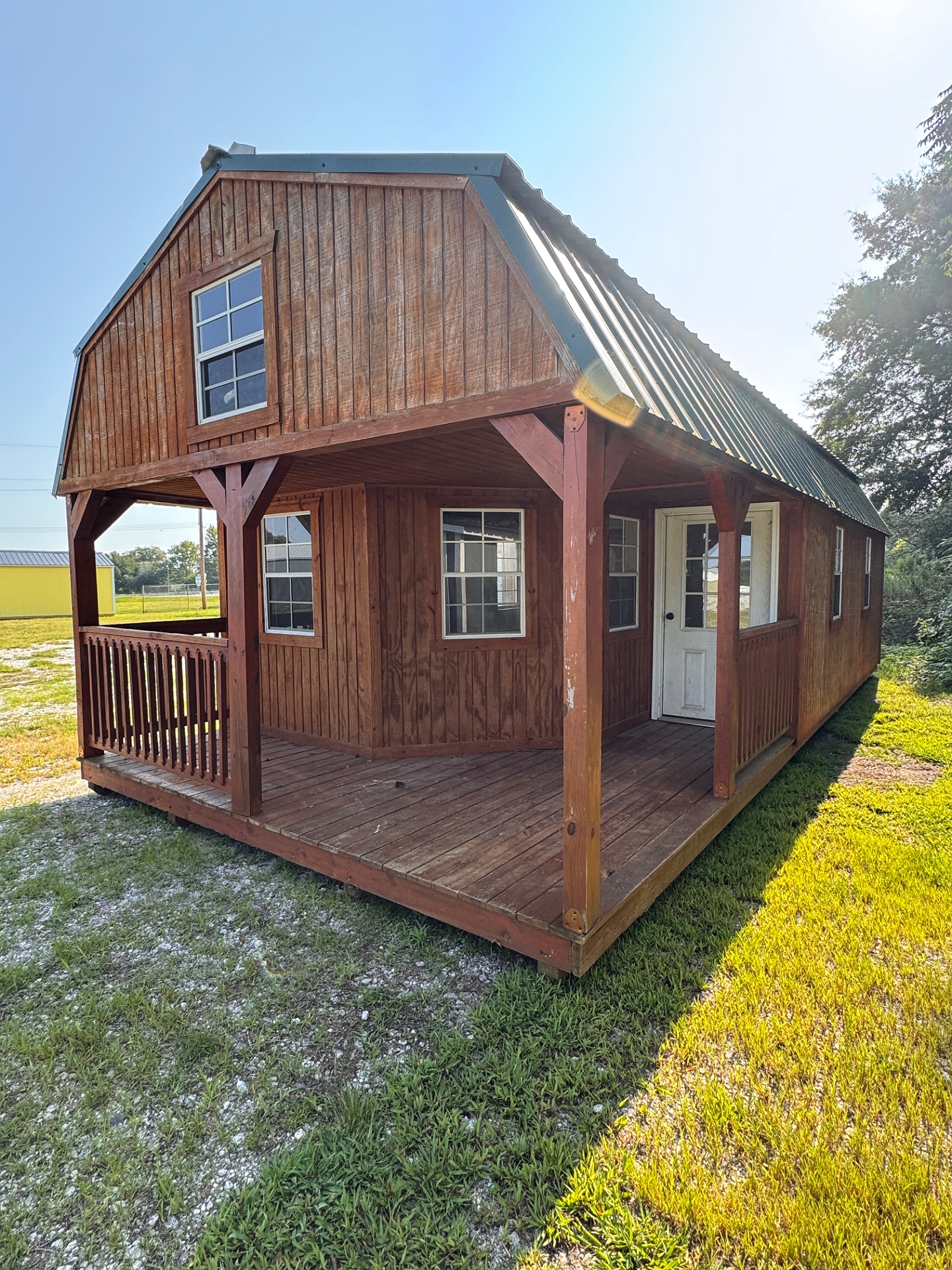 14x32 Wrap Around Porch Lofted Barn Cabin at Graceland of Cumming