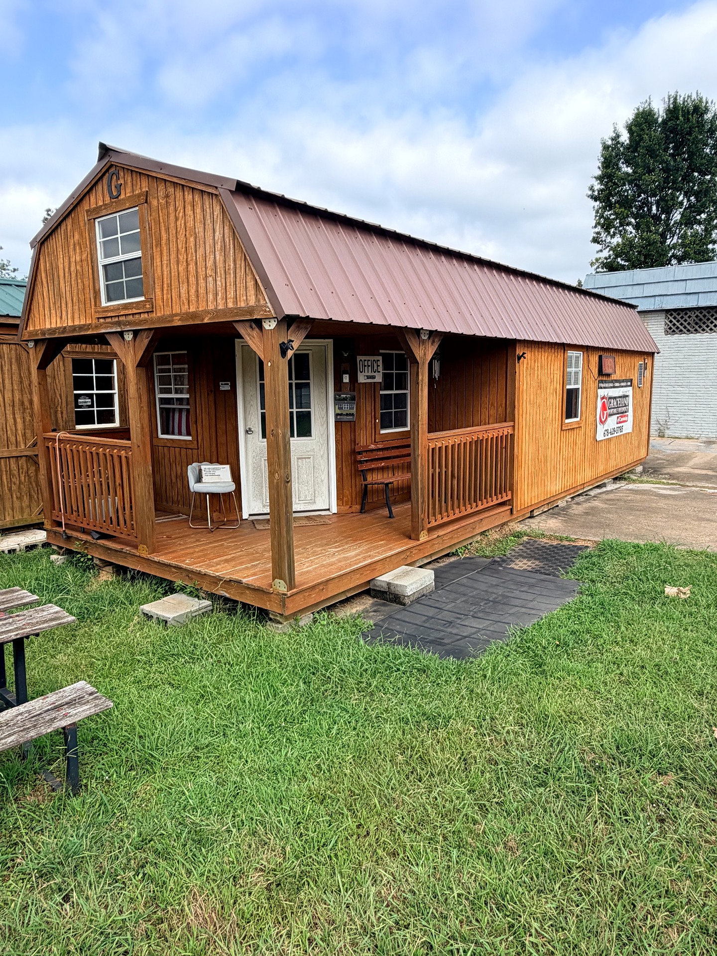 12x32 Wrap Around Porch Lofted Barn Cabin at Graceland of Cumming