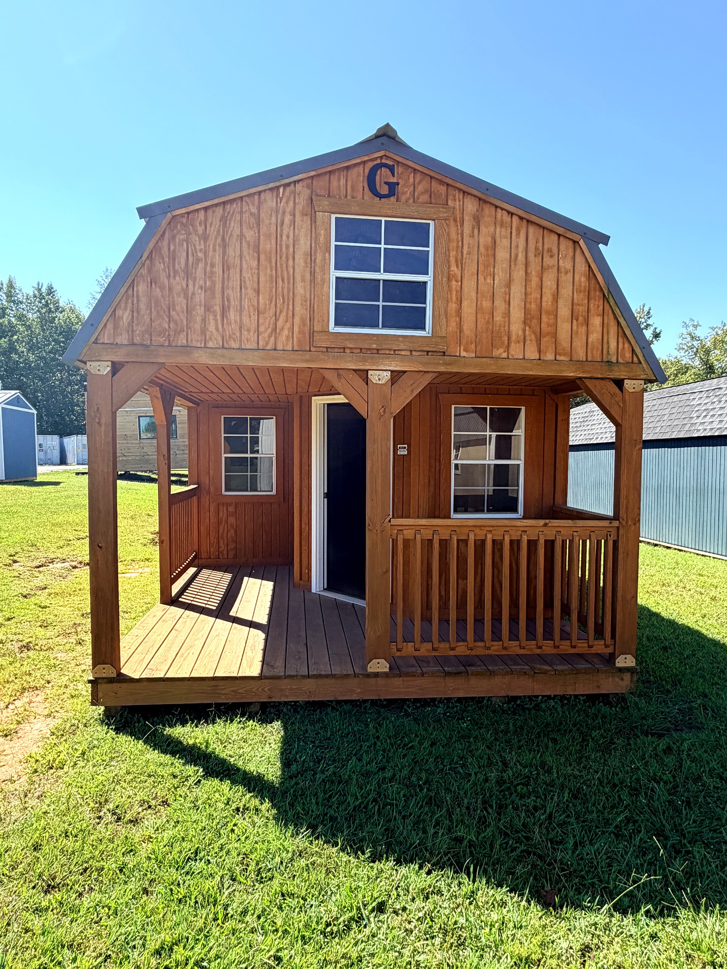 12x32 Wrap Around Porch Lofted Barn Cabin at Graceland of Cumming