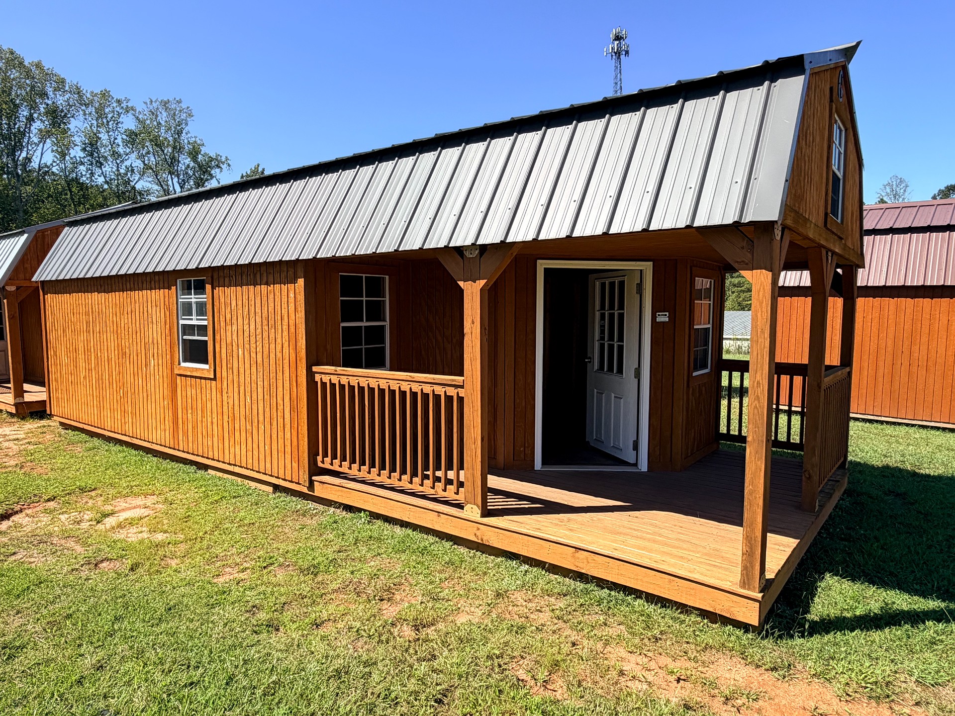 12x32 Wrap Around Porch Lofted Barn Cabin at Graceland of Cumming
