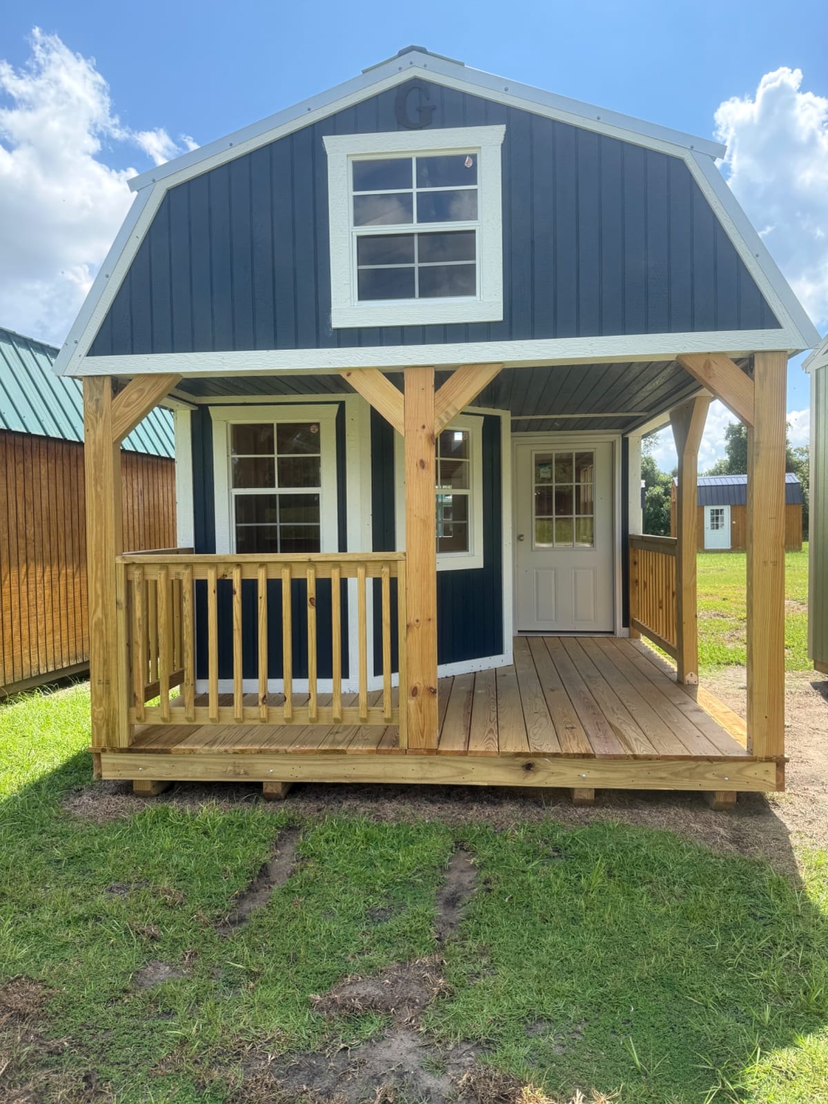 12x32 Wrap Around Porch Lofted Barn Cabin at Willis Buildings