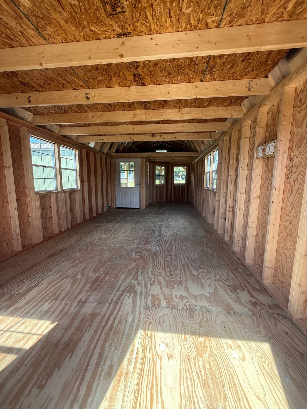12x32 Wrap Around Porch Lofted Barn Cabin at Willis Buildings