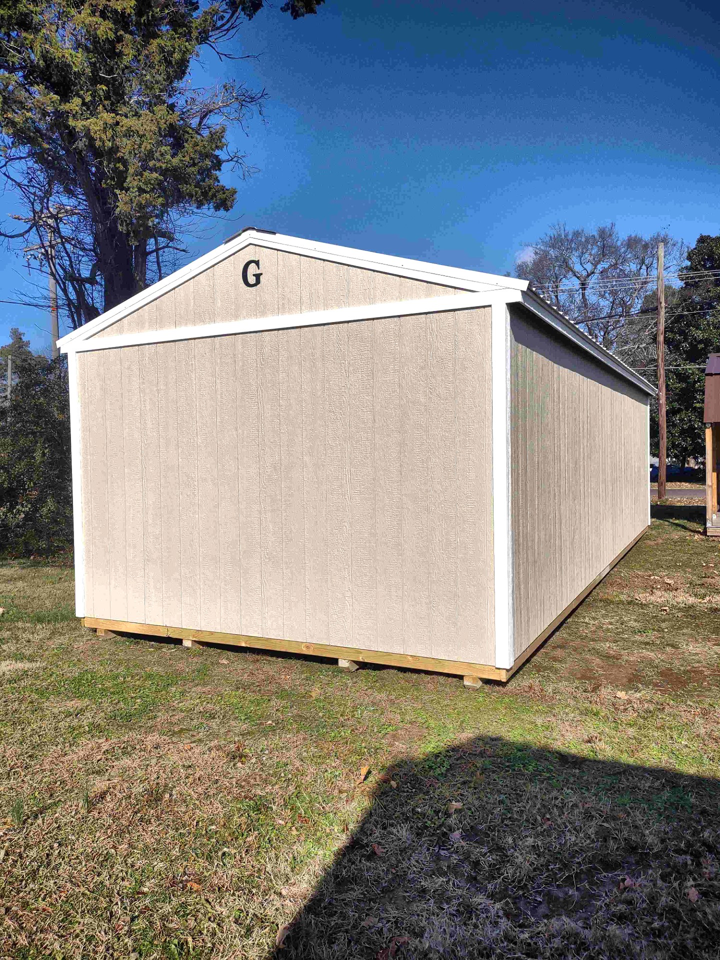 14x32 Corner Porch Cabin at Jimmy's Portable Buildings of Savannah, TN
