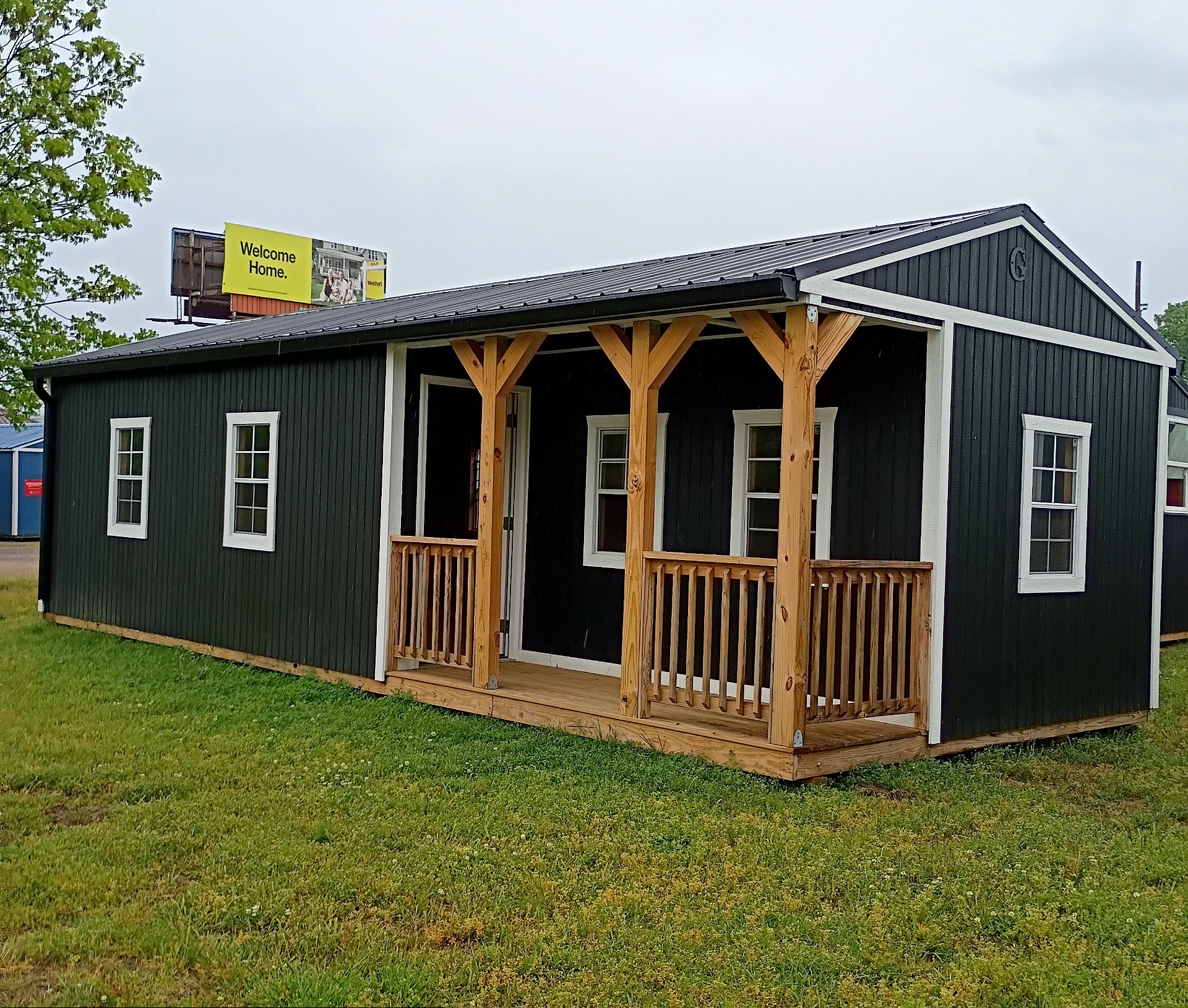 14x32 Corner Porch Cabin at Jimmy's Portable Buildings of Savannah, TN