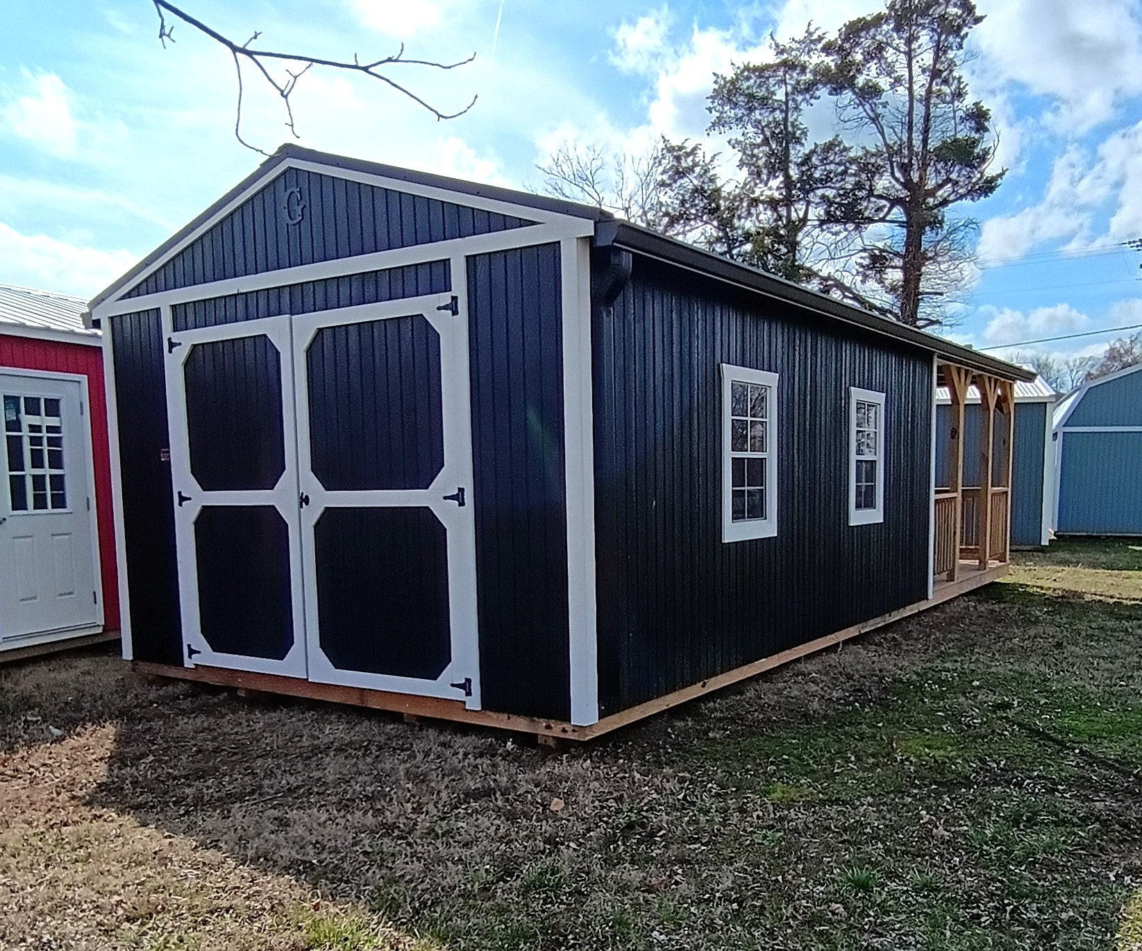14x32 Corner Porch Cabin at Jimmy's Portable Buildings of Savannah, TN