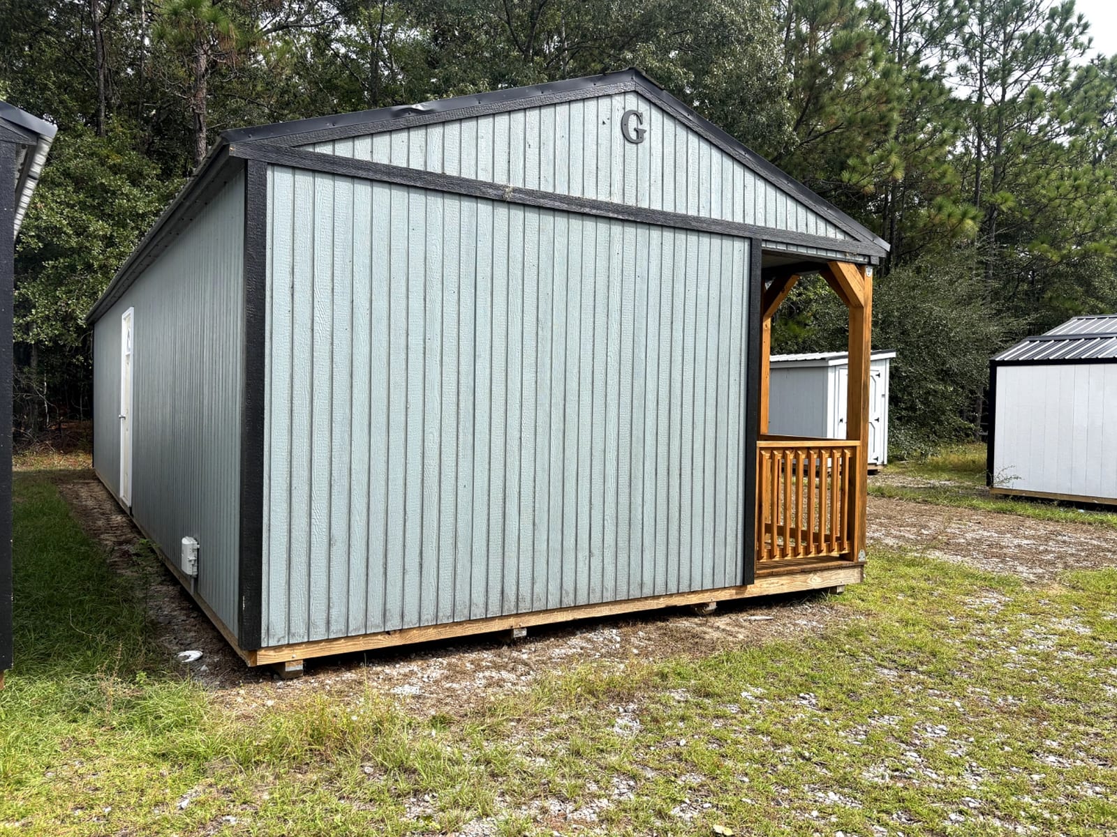 16x40 Corner Porch Cabin at Portable Buildings of Ravenel
