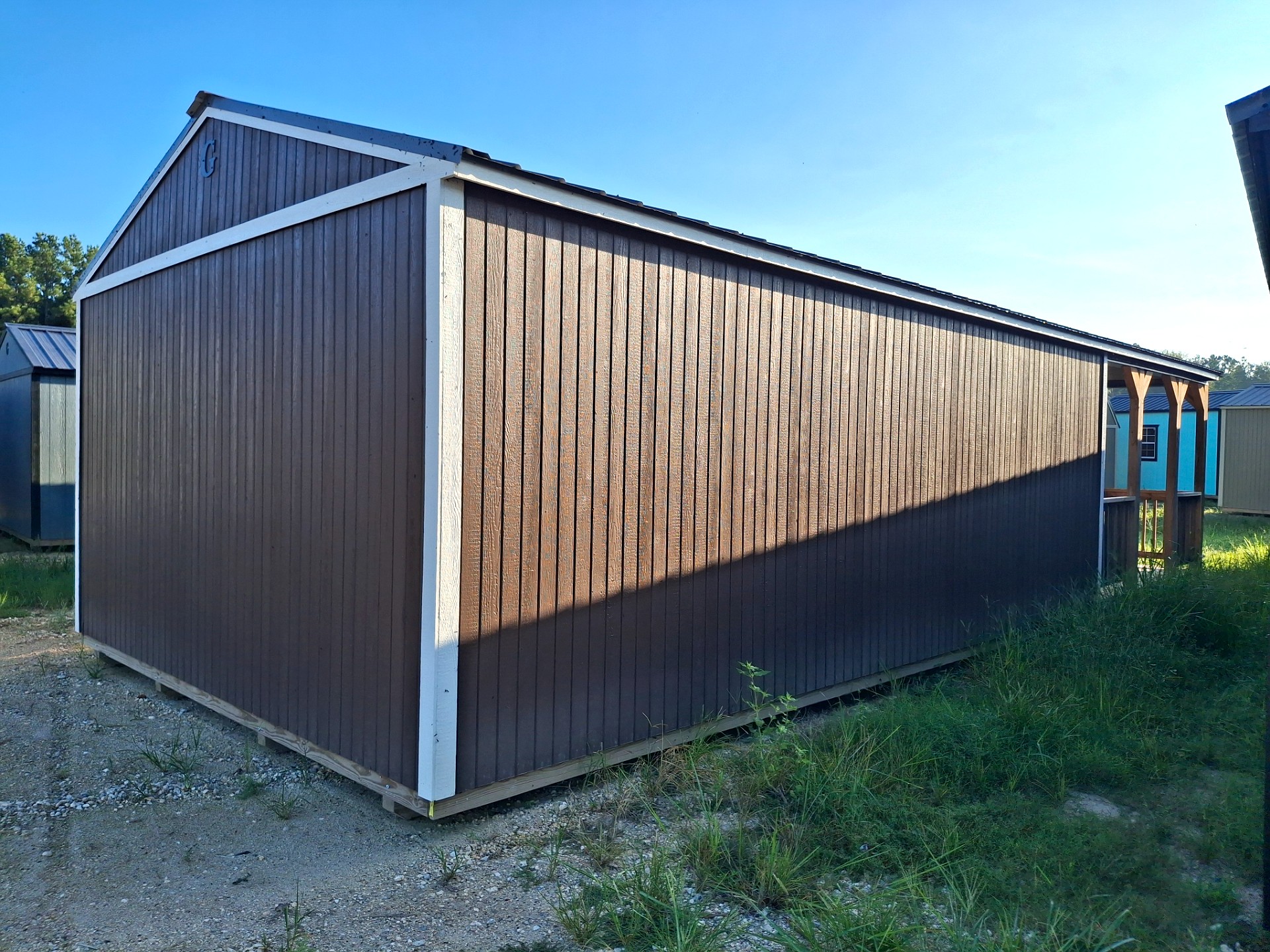 16x36 Corner Porch Cabin at Kirbyville Lot - Essex Bros