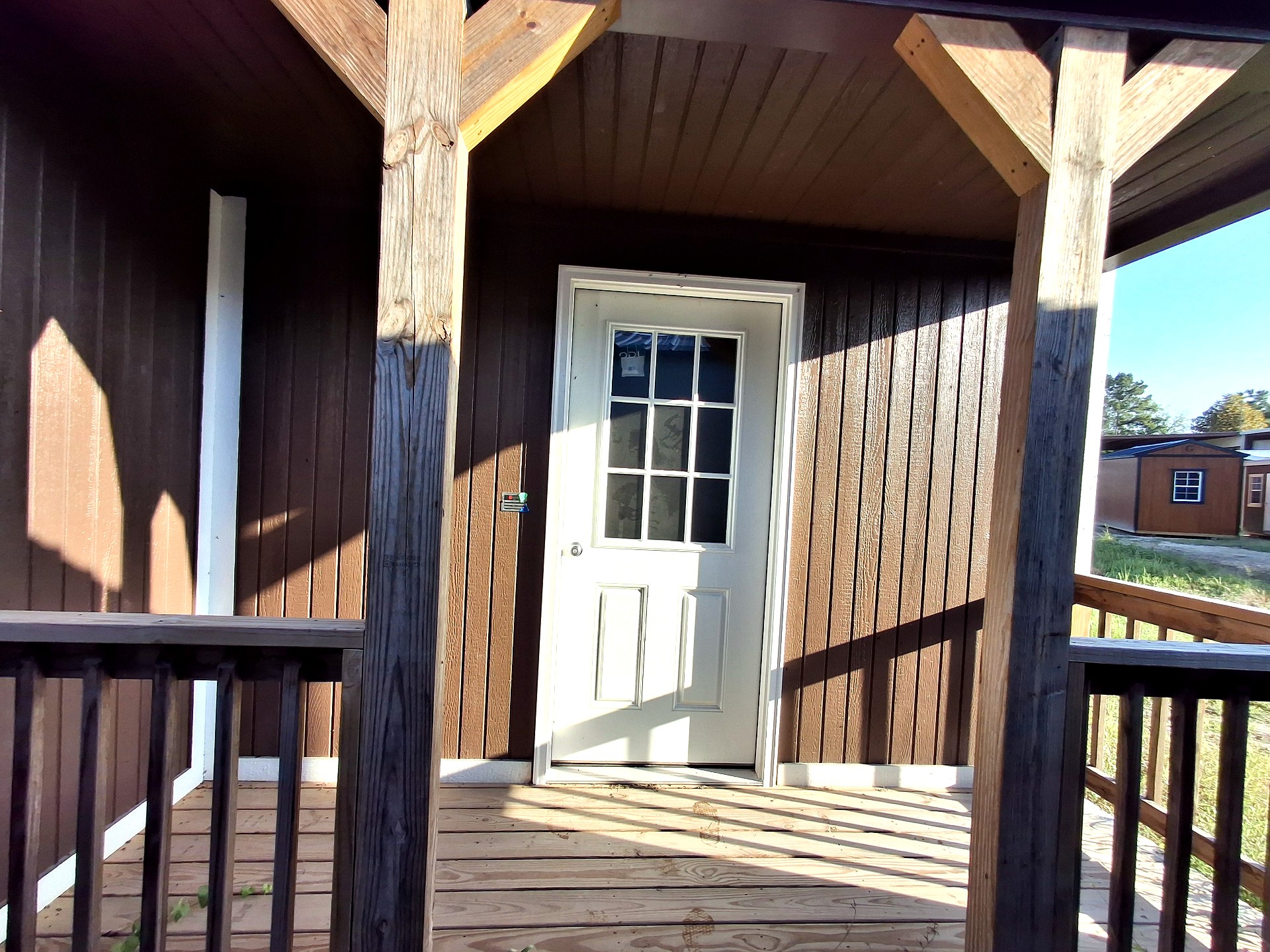 16x36 Corner Porch Cabin at Kirbyville Lot - Essex Bros