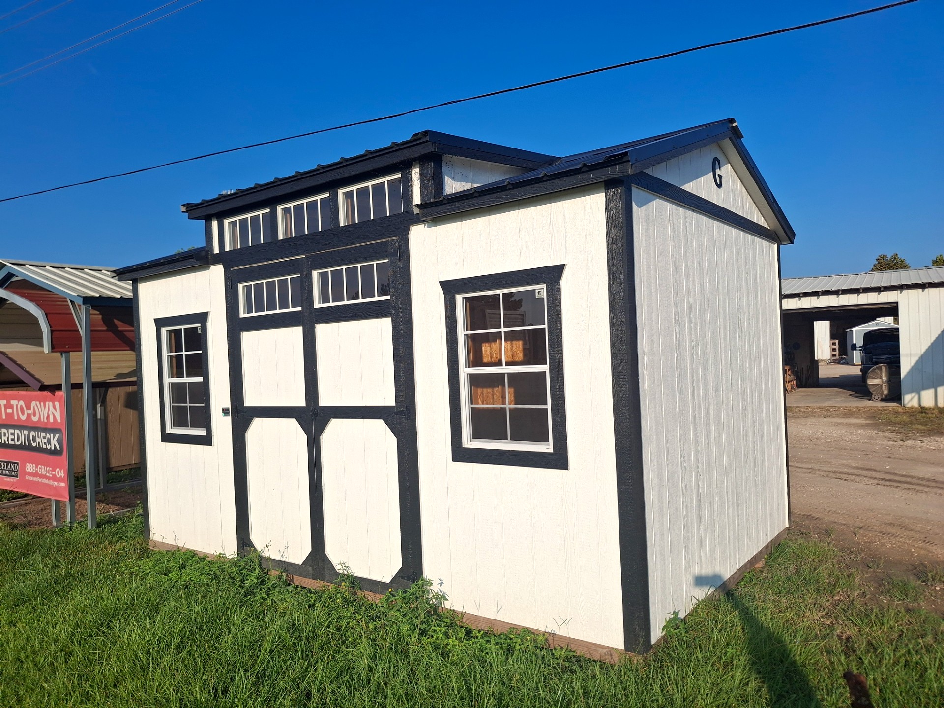 10x16 Dormer Shed Utility at Kirbyville Lot - Essex Bros