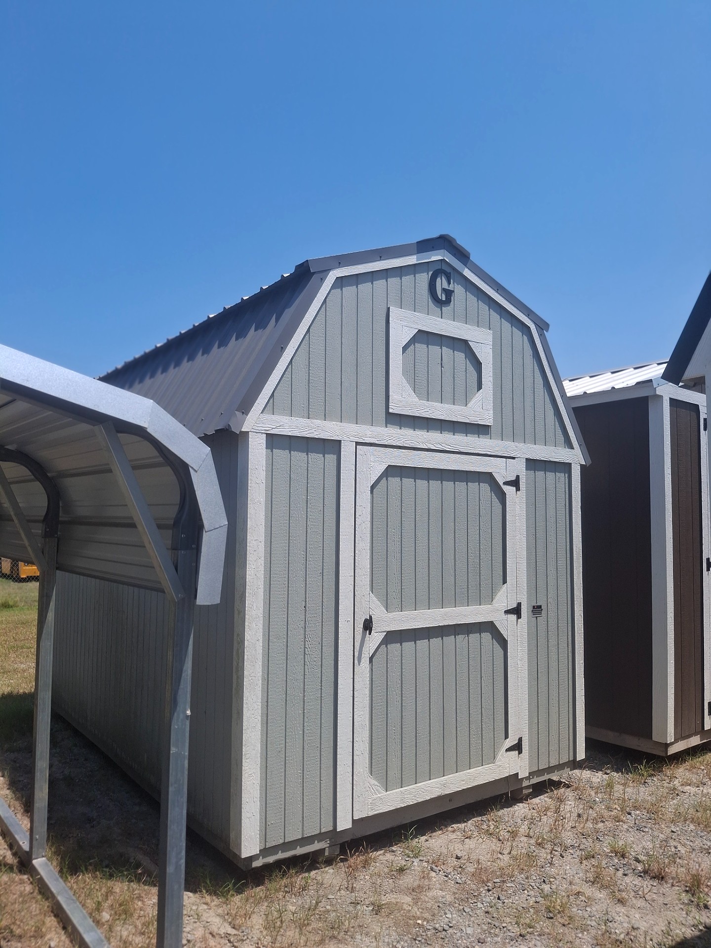 8x12 Lofted Barn at Kirbyville Lot - Essex Bros