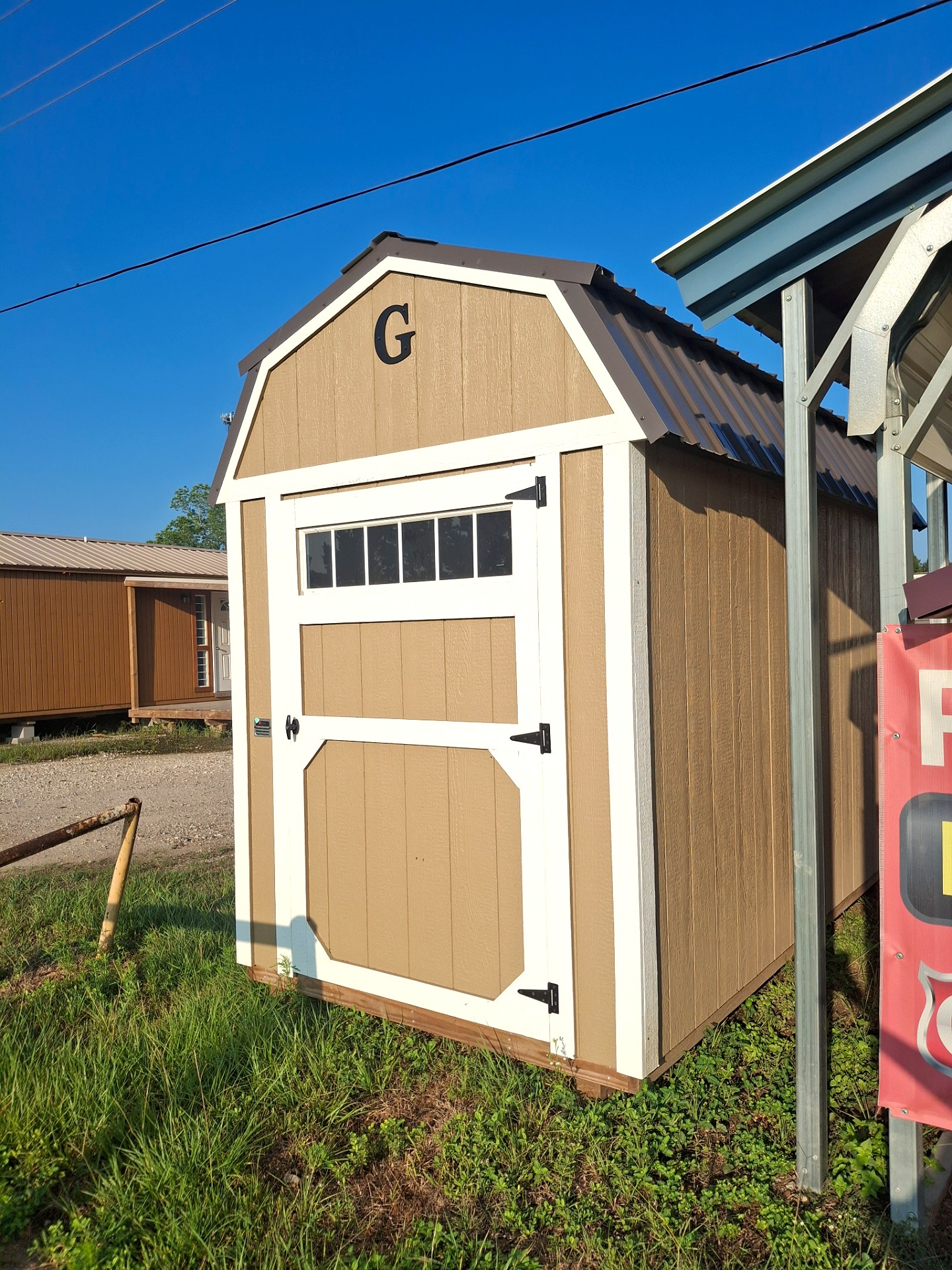 6x12 Lofted Barn at Kirbyville Lot - Essex Bros