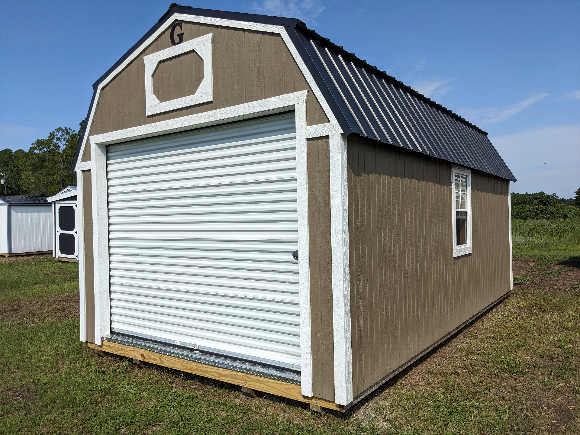 12x20 Lofted Barn Garage at Graceland Storage Sheds and Buildings of Kingsland