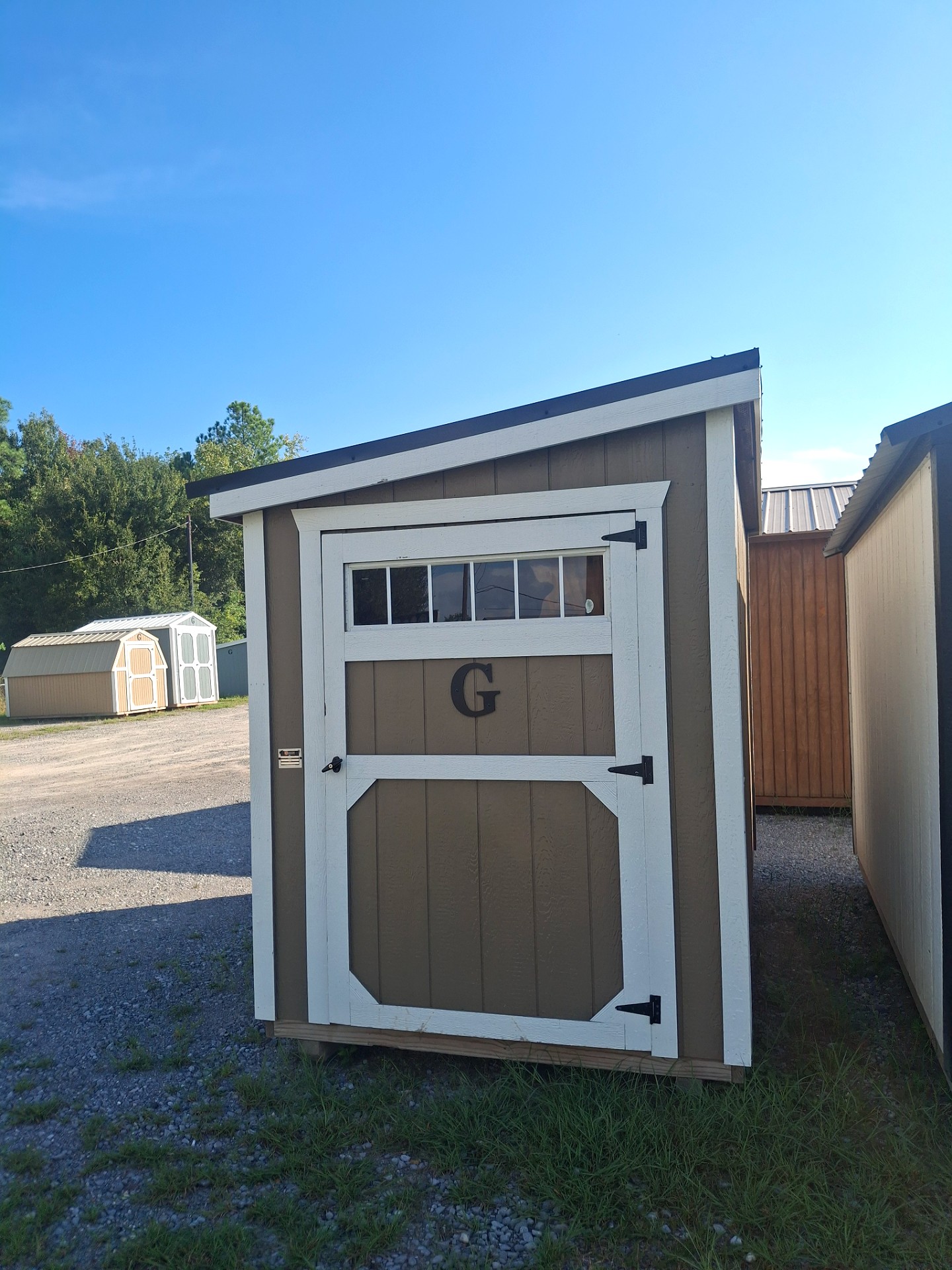 6x12 Mini Shed at Kirbyville Lot - Essex Bros