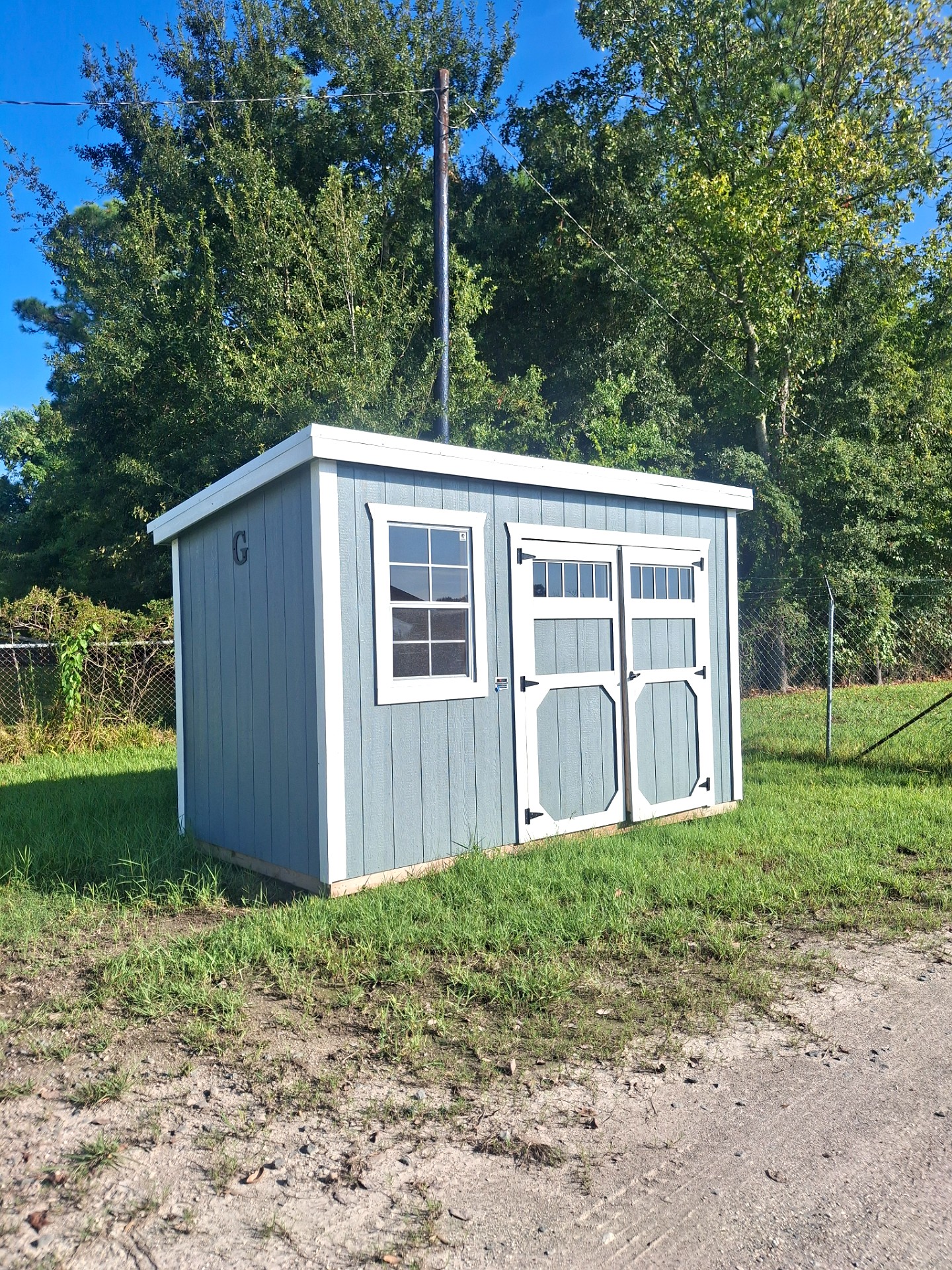 6x12 Mini Shed at Kirbyville Lot - Essex Bros