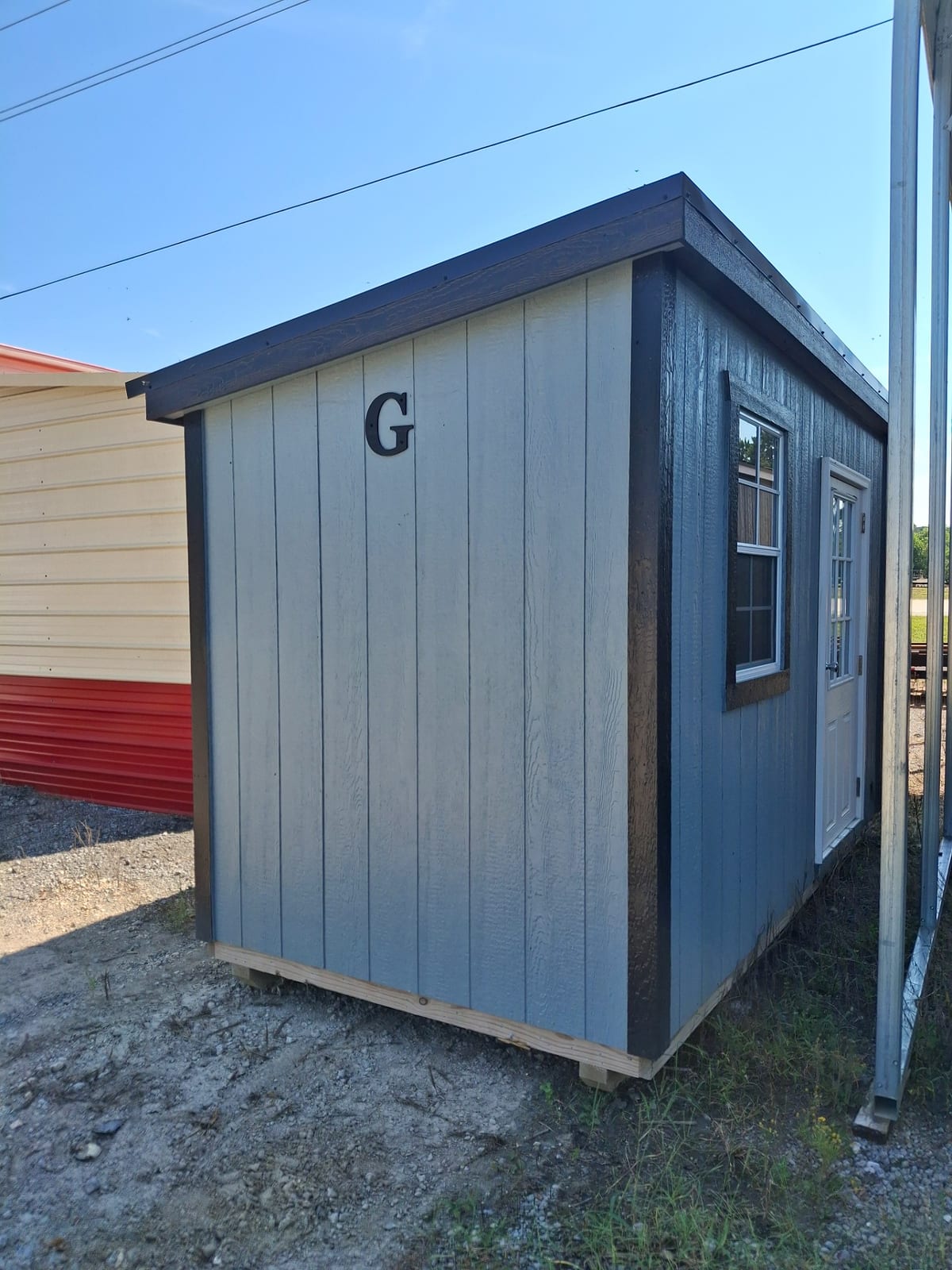 6x12 Mini Shed at Kirbyville Lot - Essex Bros