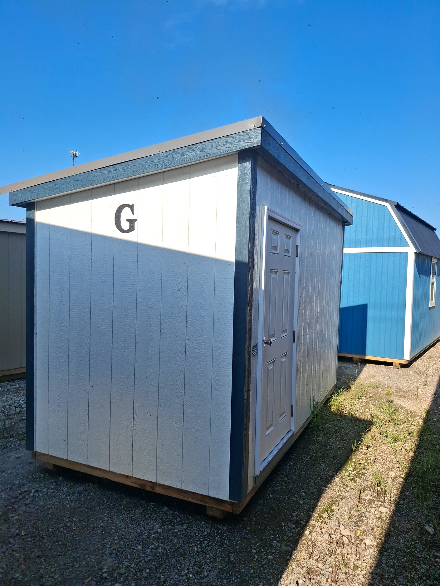 6x12 Mini Shed at Kirbyville Lot - Essex Bros