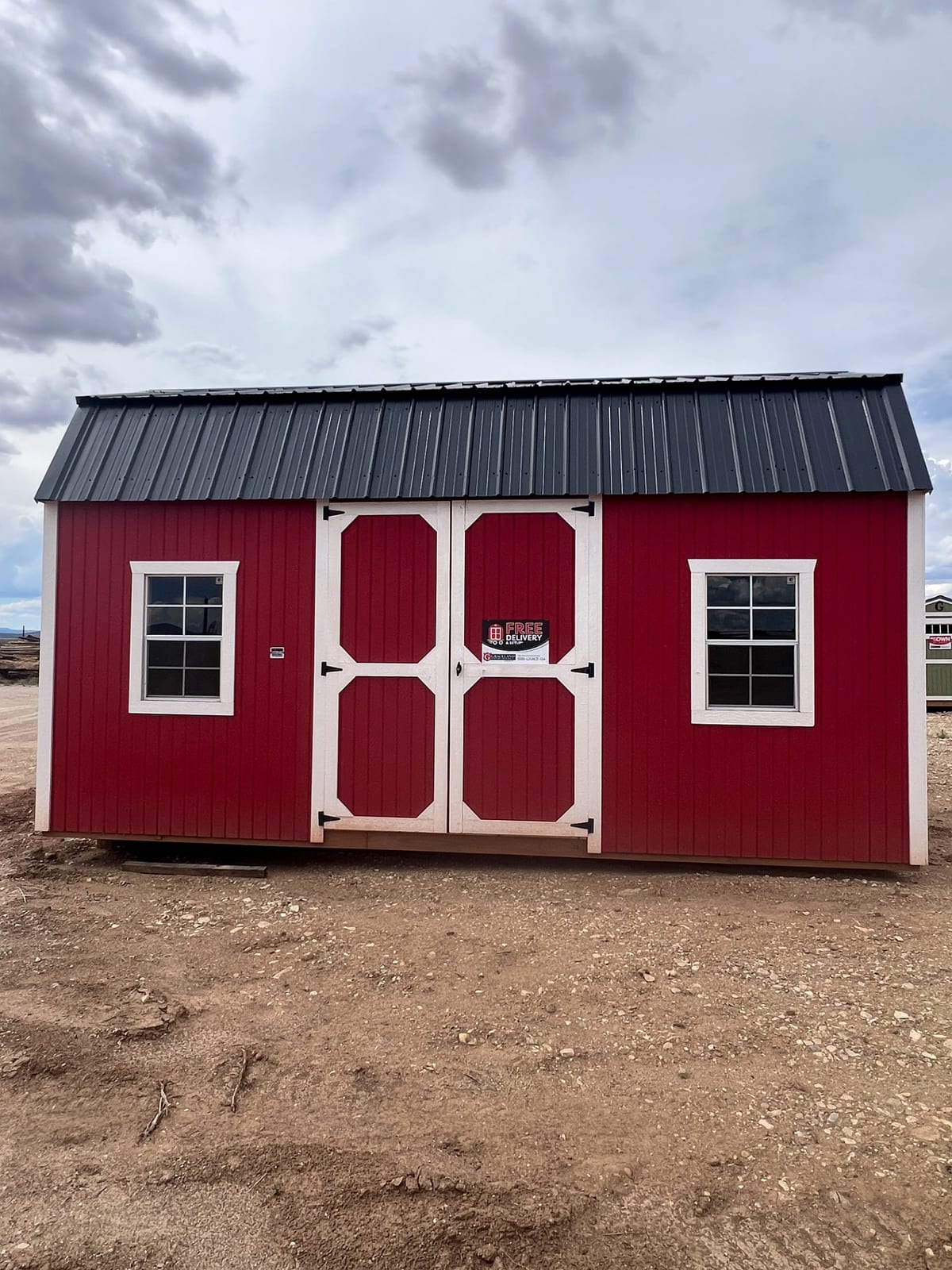 10x20 Side Lofted Barn at Graceland Portable Buildings Dealer, El Prado. Taos House & Stone