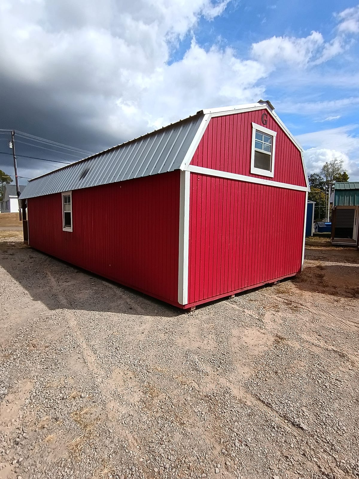 14x36 Wrap Around Porch Lofted Barn Cabin at Jimmy's Portable Buildings of Savannah, TN