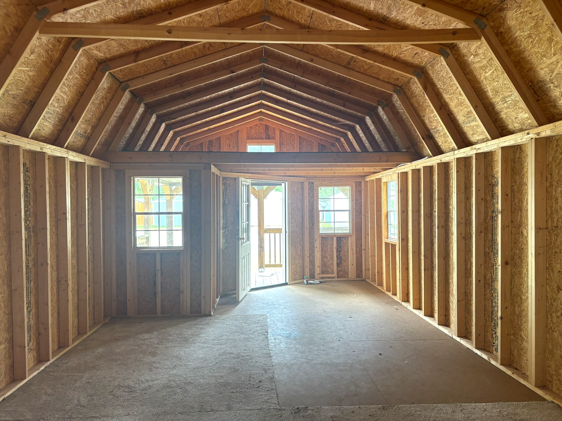 14x40 Wrap Around Porch Lofted Barn Cabin at Portable Buildings of Ravenel
