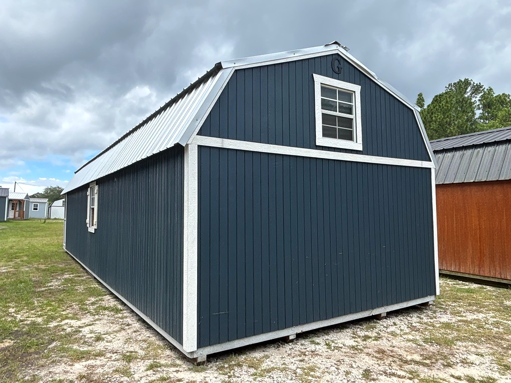 14x40 Wrap Around Porch Lofted Barn Cabin at Portable Buildings of Ravenel