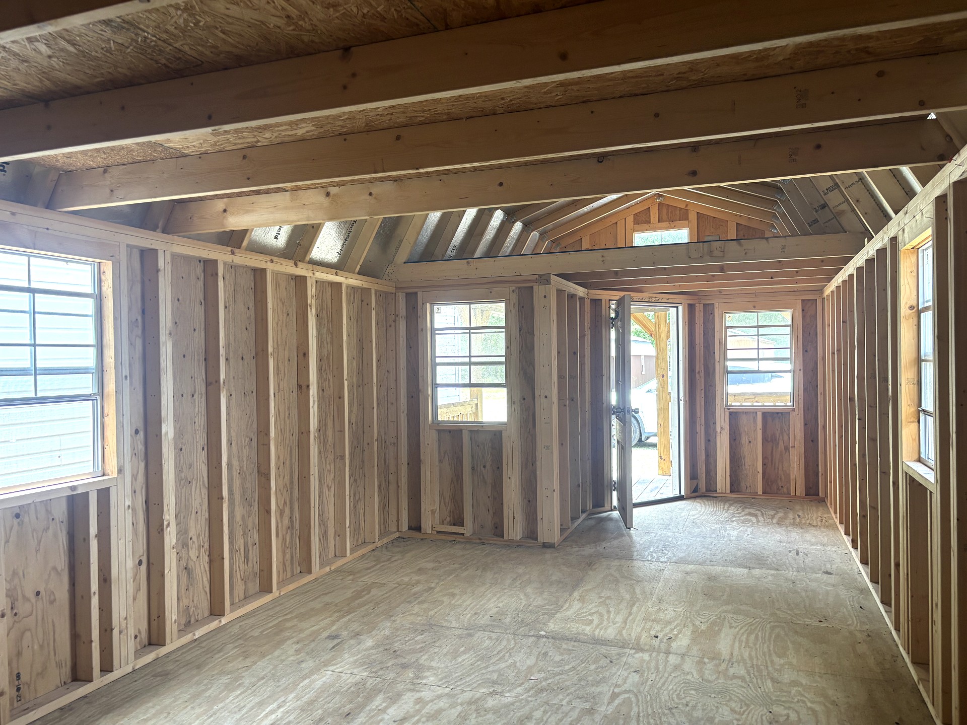 12x32 Wrap Around Porch Lofted Barn Cabin at Portable Buildings of Ravenel