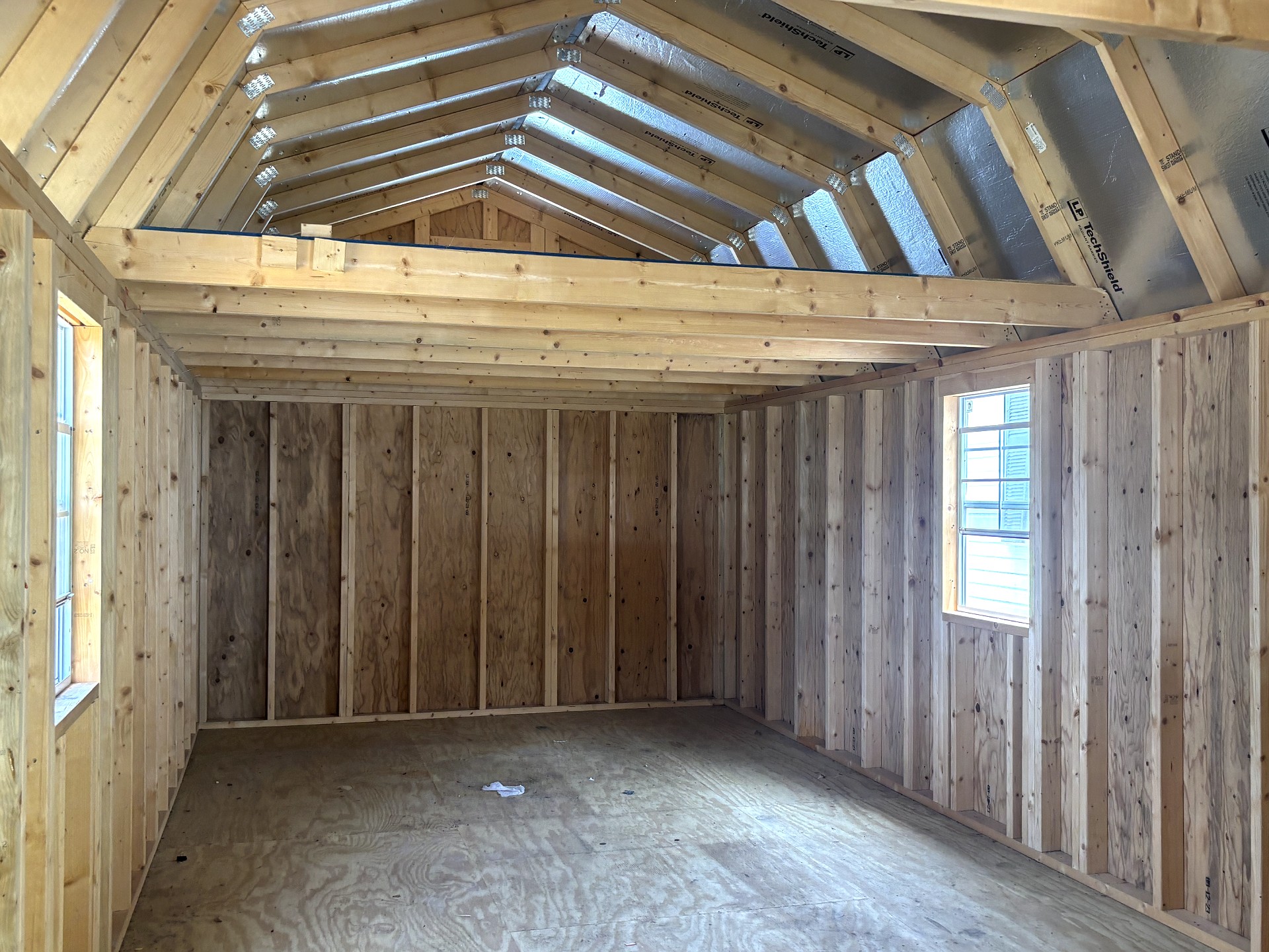 12x32 Wrap Around Porch Lofted Barn Cabin at Portable Buildings of Ravenel