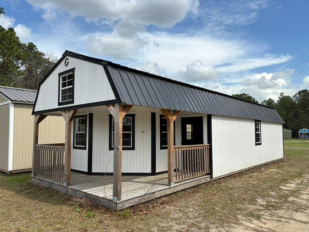 14x40 Wrap Around Porch Lofted Barn Cabin at Portable Buildings of Ravenel