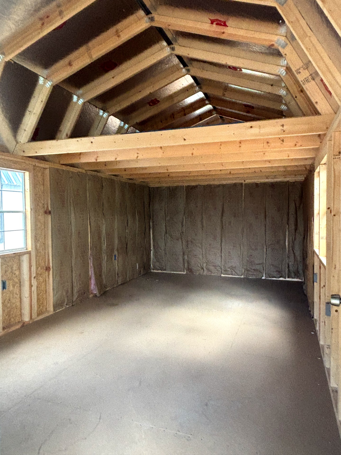 12x32 Wrap Around Porch Lofted Barn Cabin at Portable Buildings of Ravenel