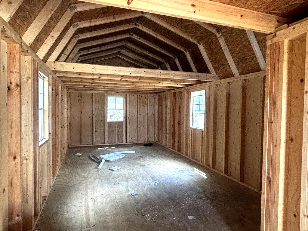 12x32 Wrap Around Porch Lofted Barn Cabin at Portable Buildings of Ravenel