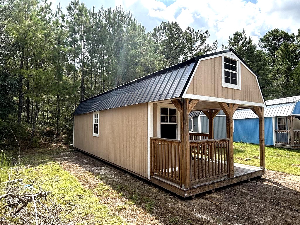 12x32 Wrap Around Porch Lofted Barn Cabin at Portable Buildings of Ravenel