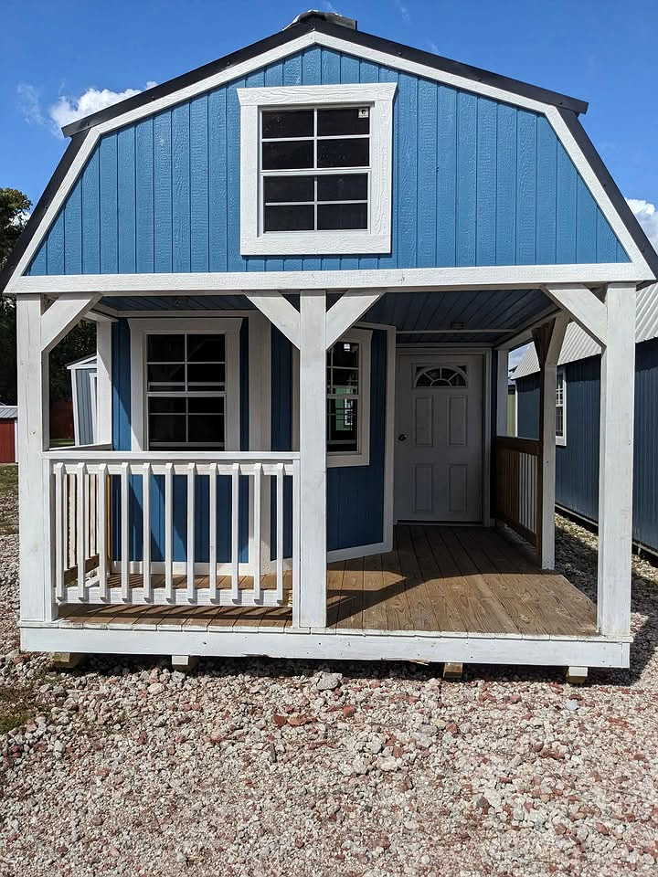 12x32 Wrap Around Porch Lofted Barn Cabin at Graceland Storage Sheds and Buildings of Kingsland