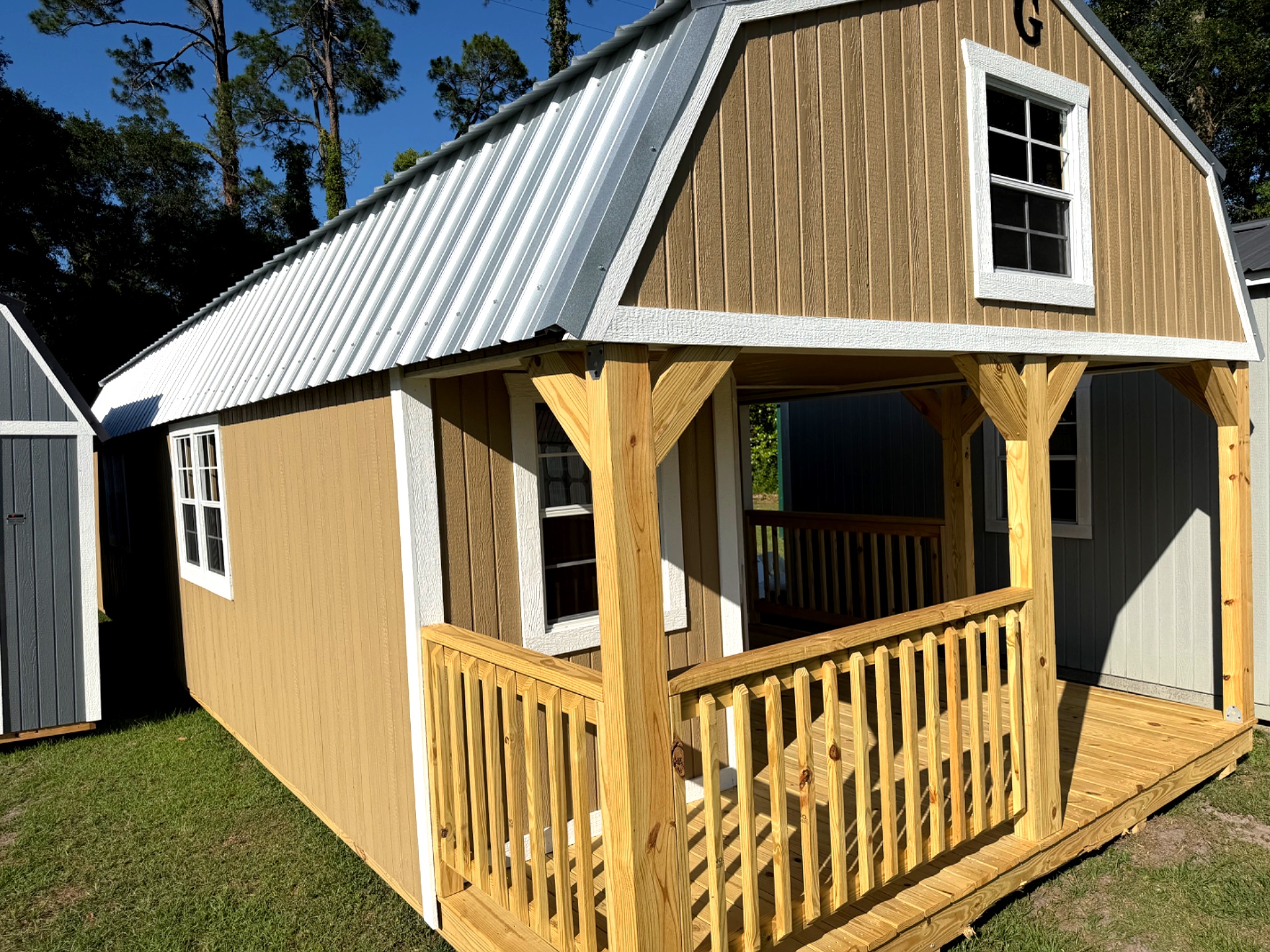 14x40 Wrap Around Porch Lofted Barn Cabin at Willis Buildings