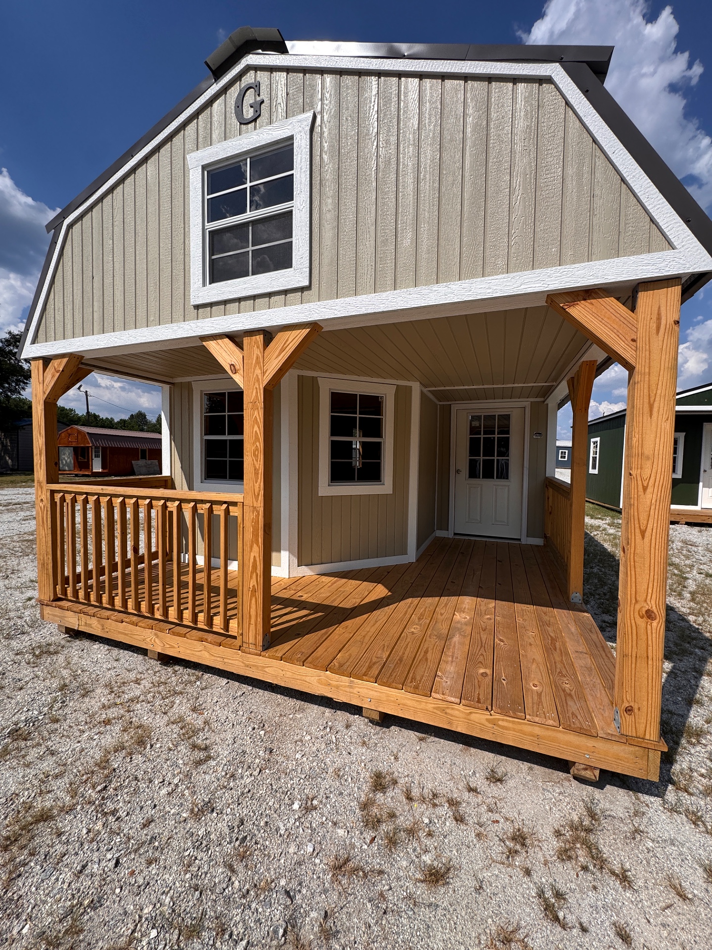 14x40 Wrap Around Porch Lofted Barn Cabin at Graceland of Cumming