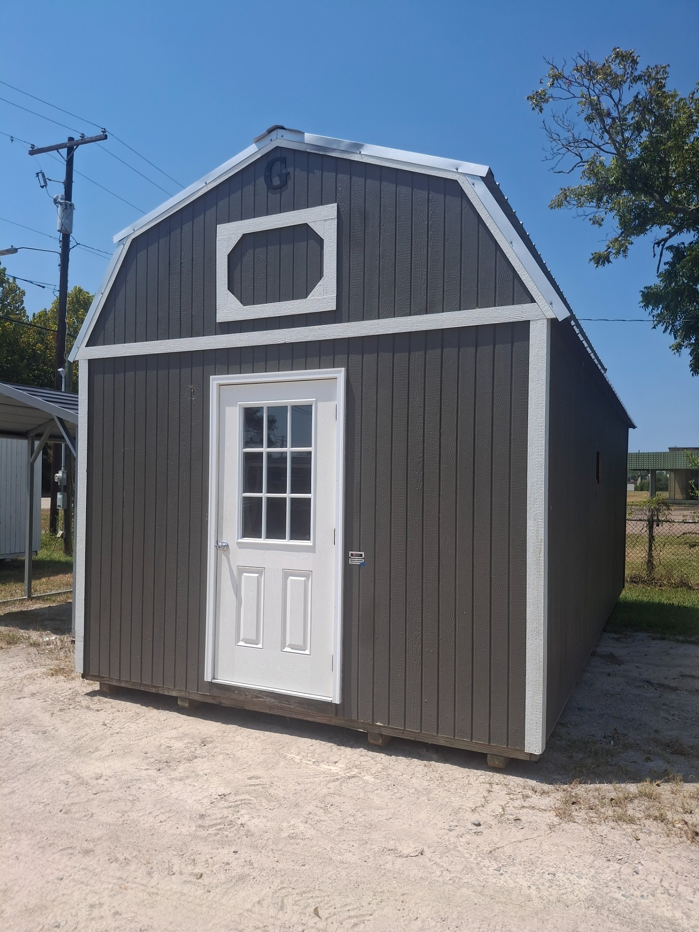 12x24 Lofted Barn at Kirbyville Lot - Essex Bros